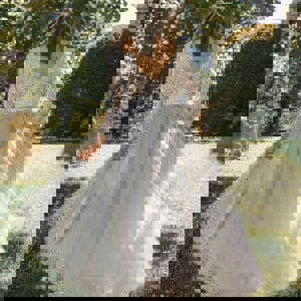 Flower girl swirling in the dress