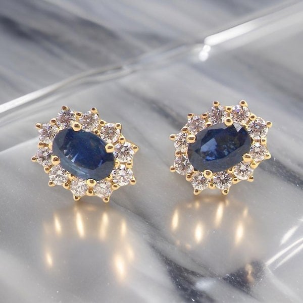 Vintage Tom A pair of Sapphire and Diamond Cluster Earrings