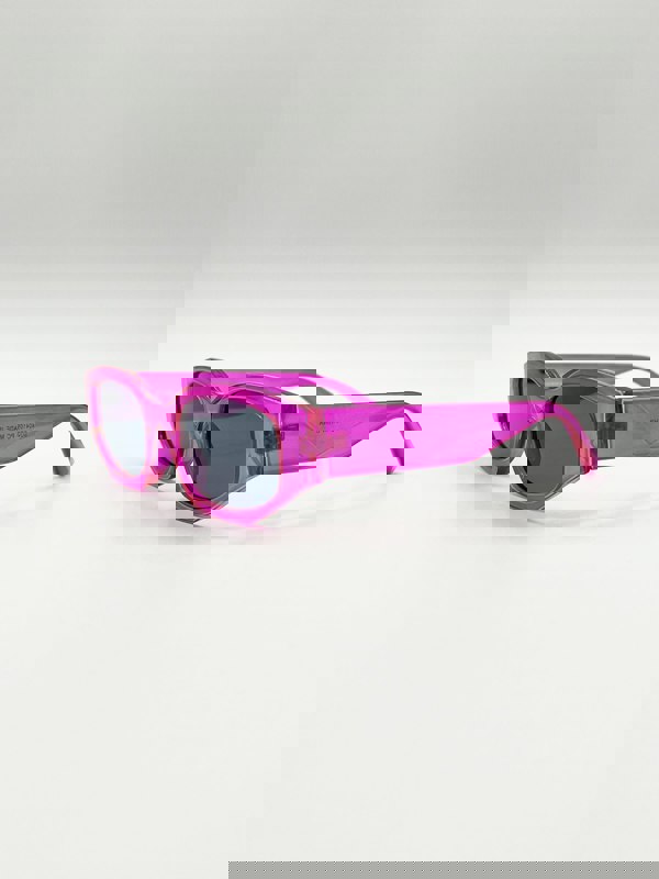 SVNX Angular Sunglasses in Translucent Hot Pink