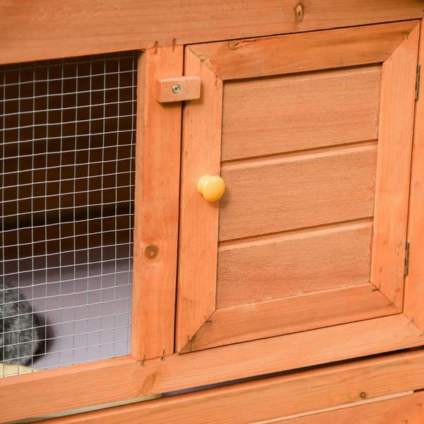 Outdoor wooden rabbit hutch door with wire mesh panel and latch