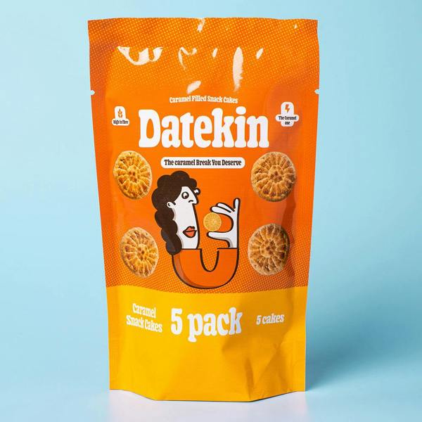 Orange packaging of Datekin caramel cakes with a cartoon character on a light blue background