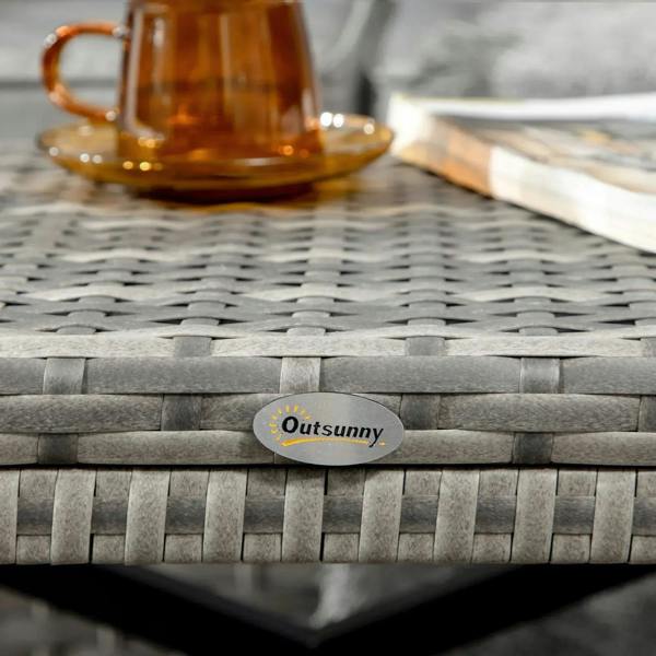 Close-up of grey woven rattan tabletop with small Outsunny logo medallion