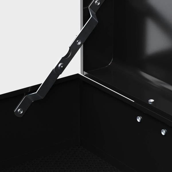 Steel tool chest interior with open lid supported by metal struts