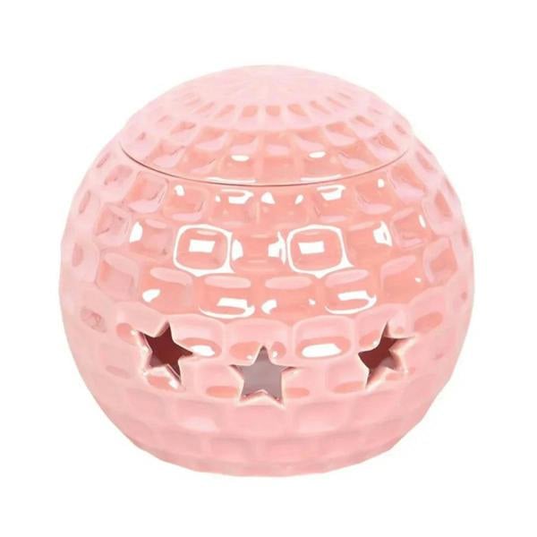 Pink disco ball oil burner with embossed texture and star cutouts
