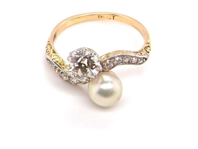 Vintage Tom A fine pearl and diamond two stone ring