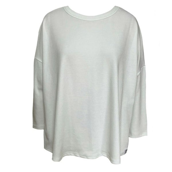 This is a cut out of a cream top against a white background. The 3/4 quarter sleeves  are ideal. The neck is scooped and the fabric is a narrow rib. 