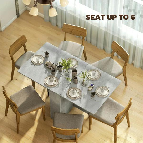 Grey folding dining table expanded for seating with two-tier shelf and rolling casters
