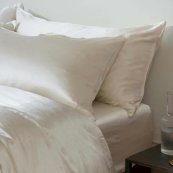 Ivory Mulberry Silk 30cm Standard Fitted Sheets in a styled bedroom 2 | Soak and Sleep