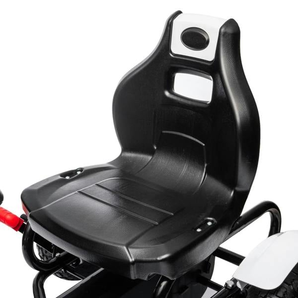 Black molded seat and handlebar area on a white kids pedal go-kart