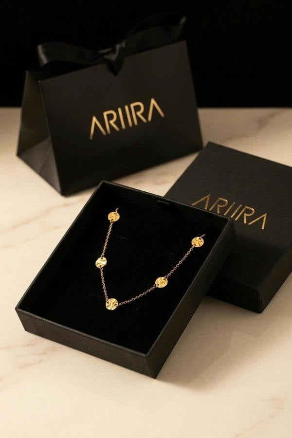 ARIIRA Isadora Hammered Disc Station Necklace