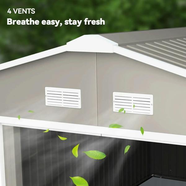 Light grey metal shed front with two vent panels under the roof