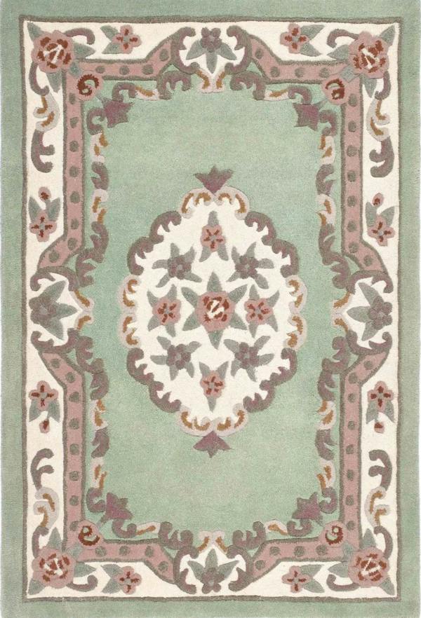 Decorative rug with floral patterns on a light green background