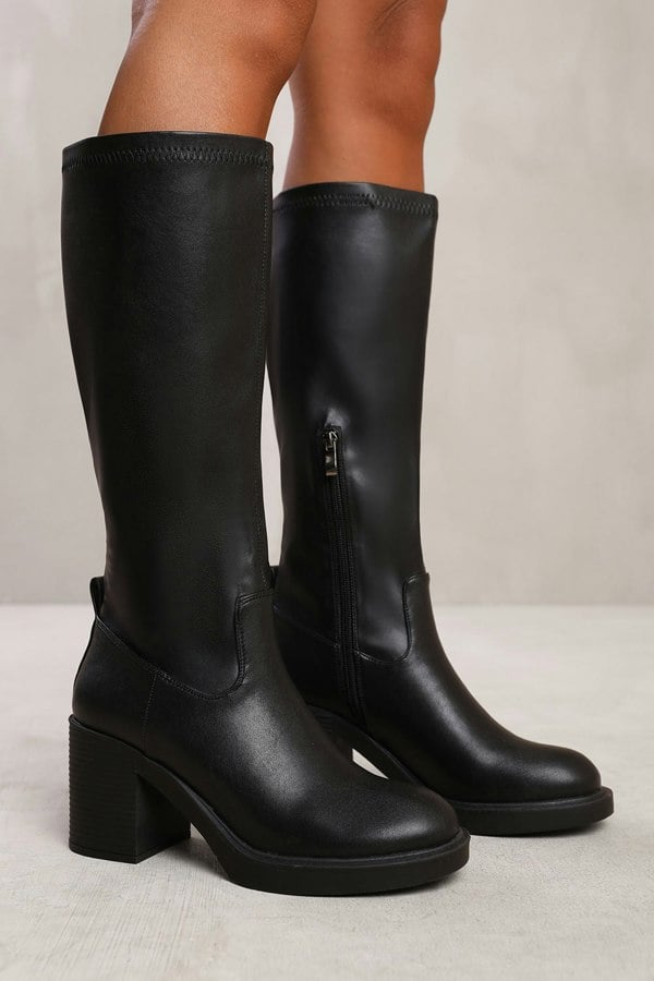 Where's That From Beta Knee High Boot With Side Zip in Black Stretch Faux Leather