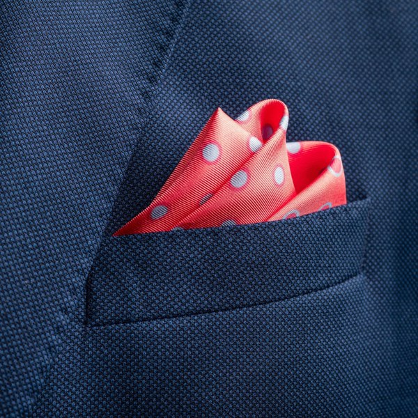 'Luna' polka dot silk pocket square in dusky pink by Otway & Orford folded in top pocket