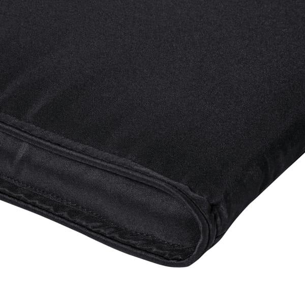 Black lounger cushion corner seam and stitched edge close-up