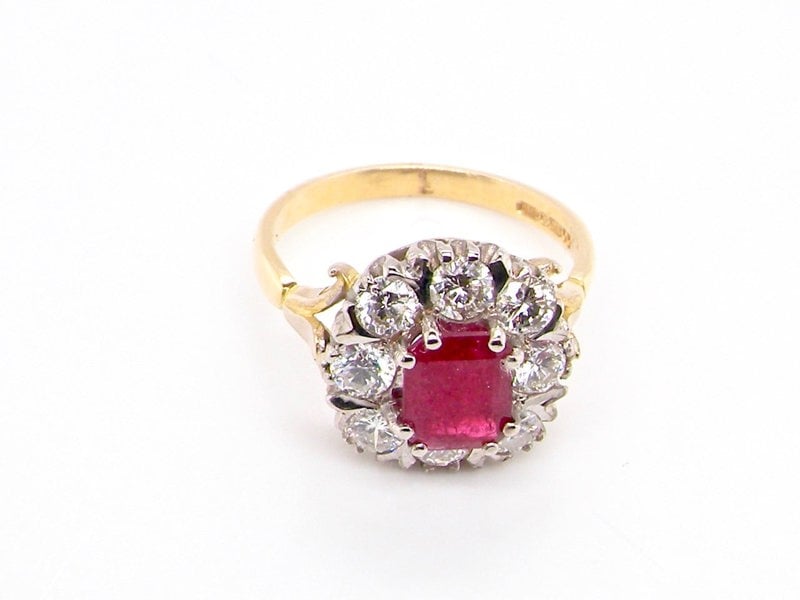 Vintage Tom A fine ruby and diamond cluster ring