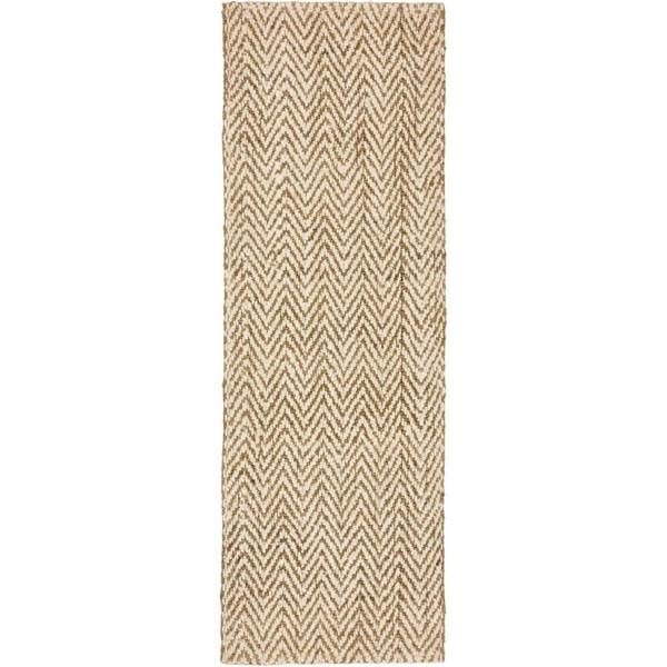 Beige and brown chevron patterned rug on a white background