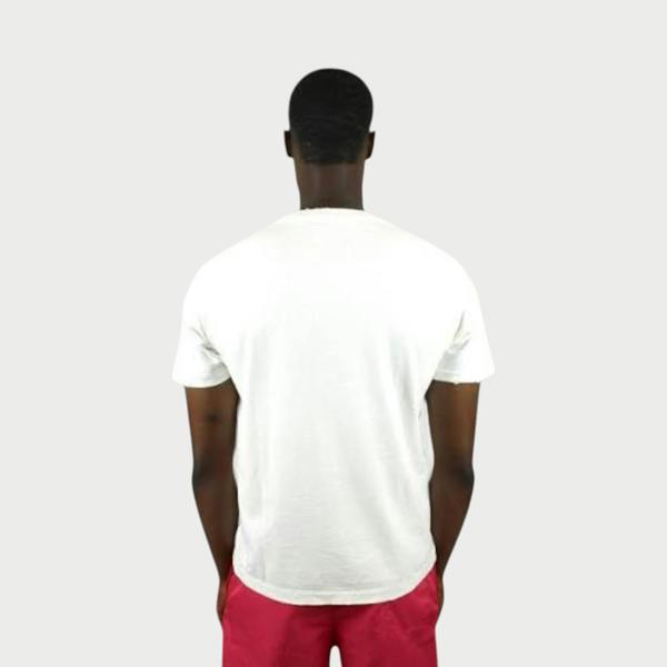 Supplied Fashion white vintage cotton t-shirt worn by a man, back view showing relaxed fit and worn-in texture.