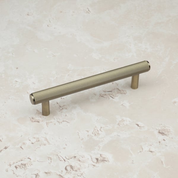 Handle & Home Antique Brass Reeded Handles and Coordinating Knobs