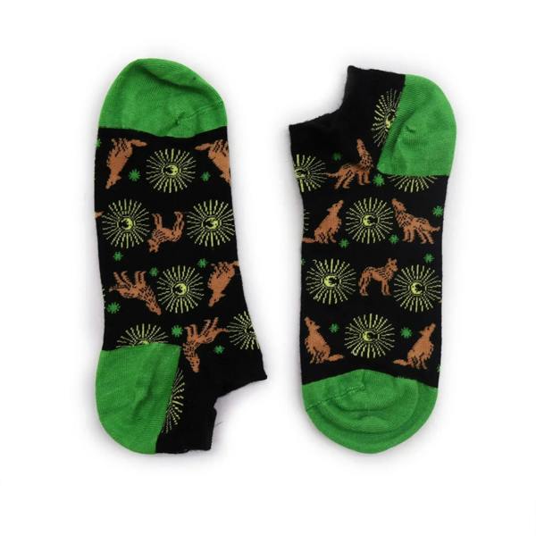 Pair of black low-cut bamboo socks with green cuffs and hare starburst pattern