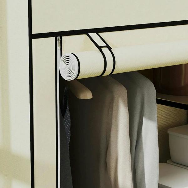 Cream fabric closet interior with rolled hanging rod and hanging garments
