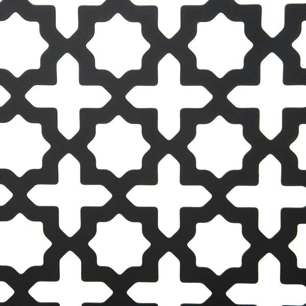 Close-up of white pattern mesh fabric on a black pet safety gate panel
