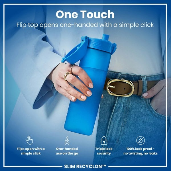 A blue water bottle is held; its flip top opens one-handed. A person, wearing a light blue jacket and jeans, holds it. "One Touch. Flip top opens one-handed with a simple click. Flips open with a simple click. One-handed use on the go. Triple lock security. 100% leak proof - no twisting, no leaks. SLIM RECYCLON™"
