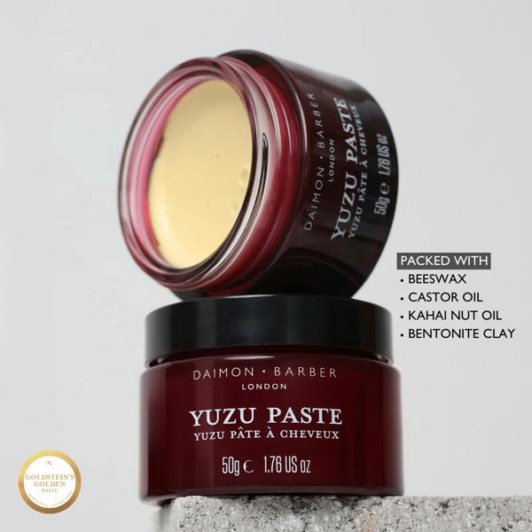 Goldstein's Golden Paste jar by Daimon Barber on a light gray background with ingredients list