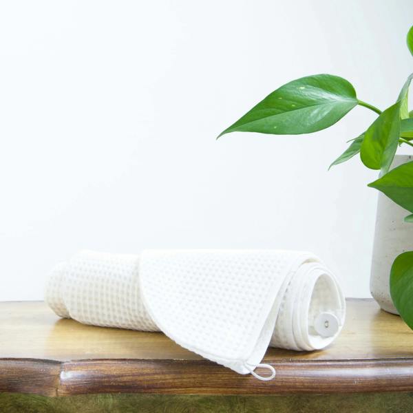 Ecru Waffle Cotton Hair Wrap styled in a bedroom 1 | Soak and Sleep