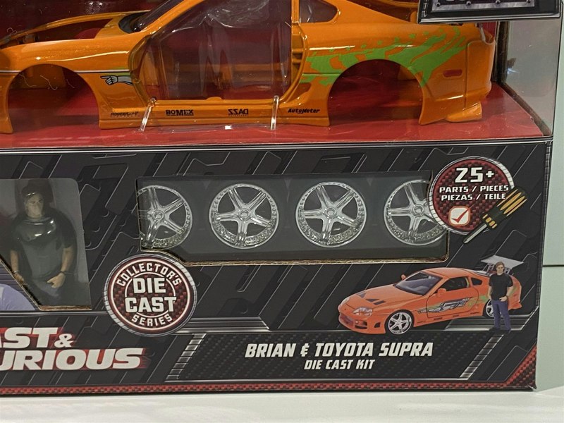 a toy car in a box