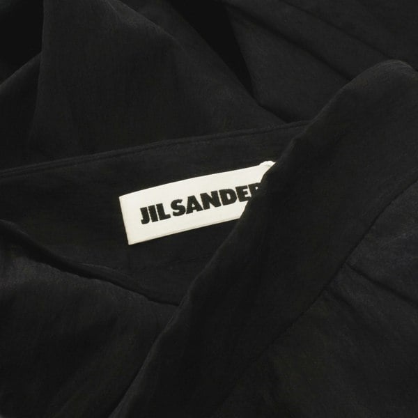 Jil Sander high waist trousers  A tapered leg trouser in a silk-blend crepe satin 