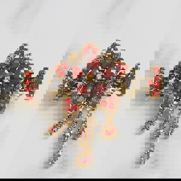 flower hair accessory in red with gems