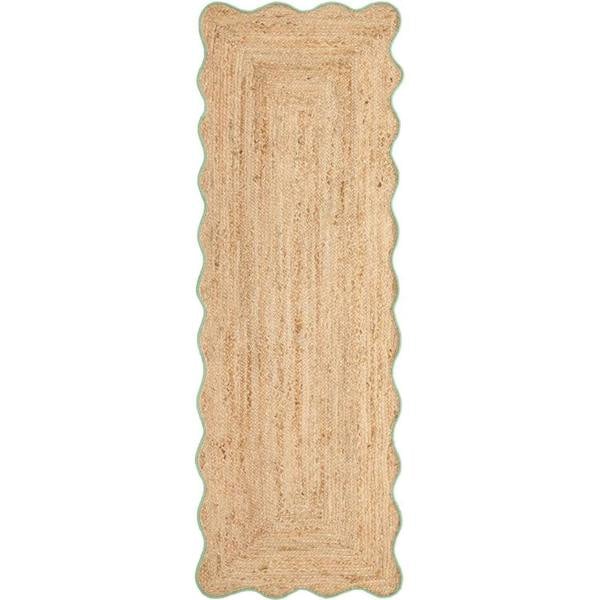 Beige braided rug on a white background