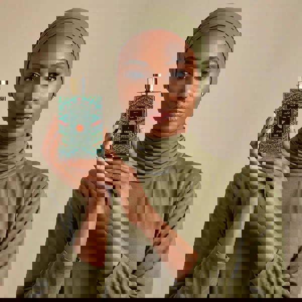 Anfar Meditation 80ml Extrait de Parfum held by woman in green