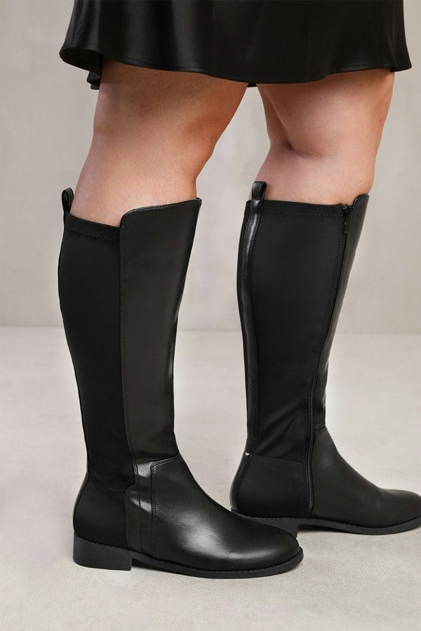 Where's That From PParker Stretch Wide Calf Knee High Boots With Side Zip In Wide E Fit In Black Faux Leather