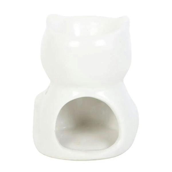 White ceramic cat oil burner with centered flame/burner opening at the base