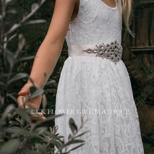 Diamante sash worn with lace dress