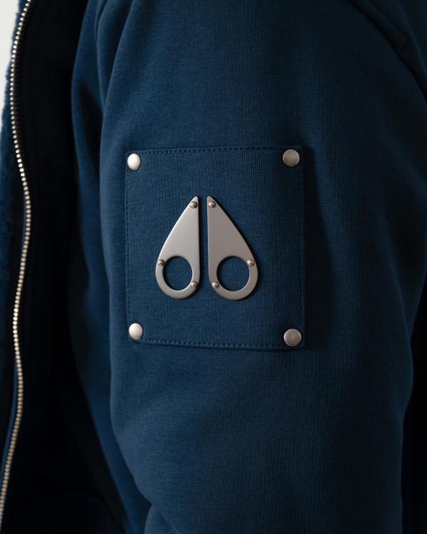 logo detail of a Moose Knuckles Classic Bunny 3 Mens Fleece Hoodie in Nightfall 2017 