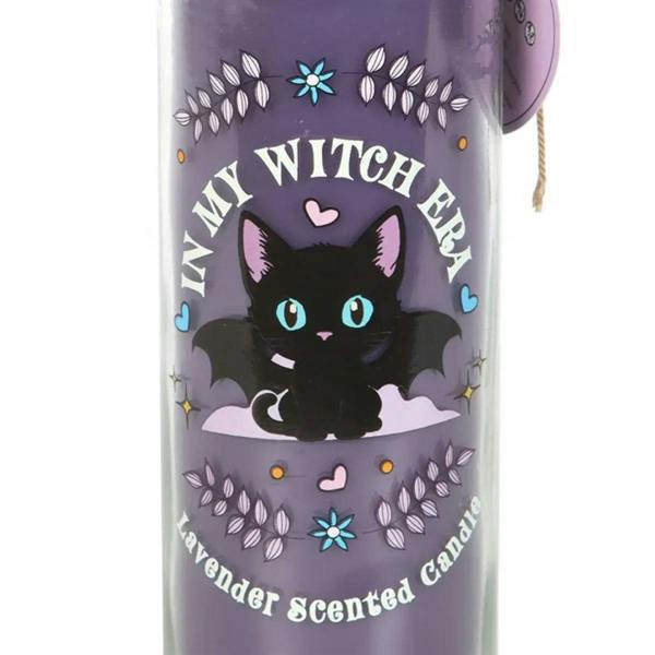 Lavender tube candle close-up of witch cat graphic and lavender-scented text