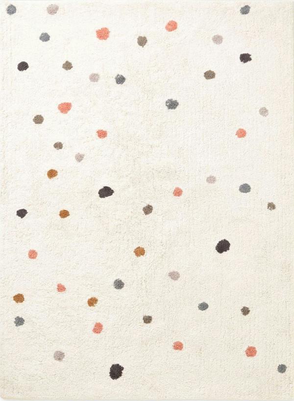 Patterned rug with multicolored dots on a beige background
