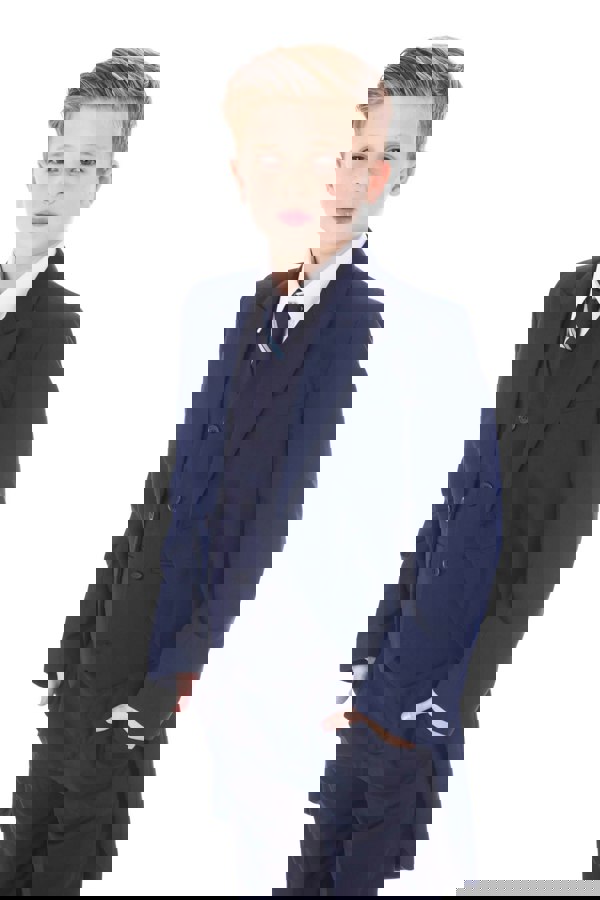 Boy wearing navy tail coat suit
