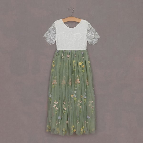 embroidered flower girls dress on hanger