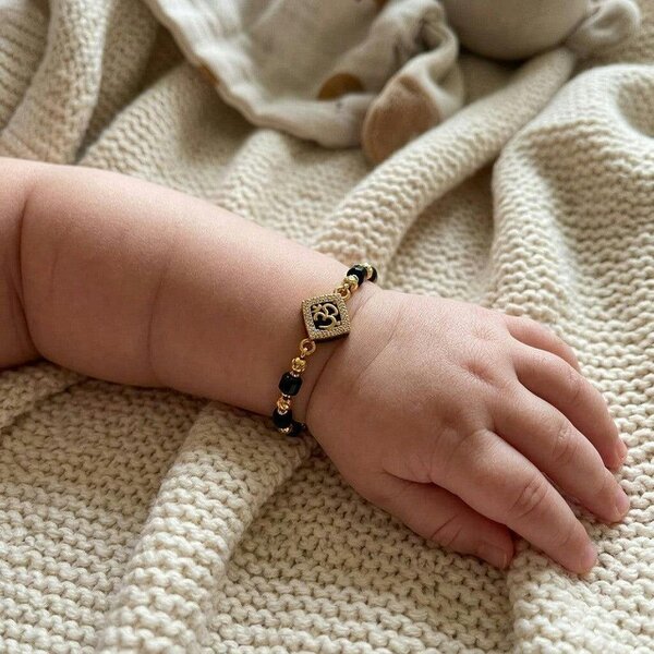 The Colourful Aura Gold Plated Black Bead Om Zircon Centre Charm Kids Nazaria Bracelet