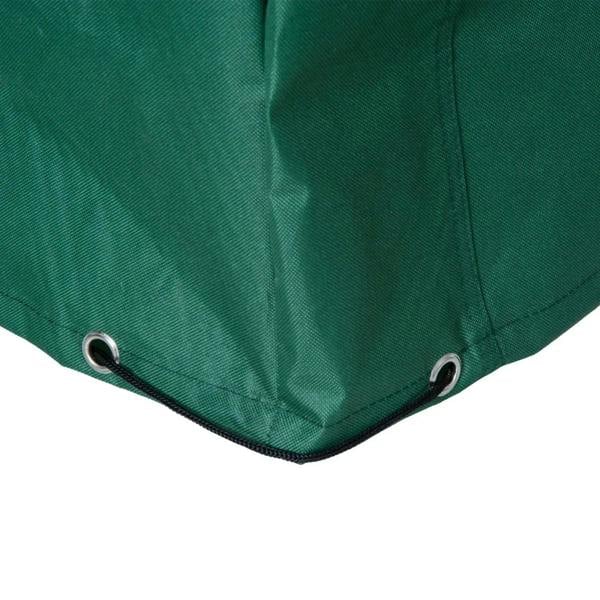 Close-up of dark green furniture cover corner with round grommets and black trim