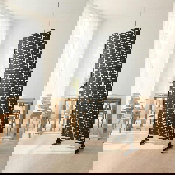 Privacy screen used as a room divider in a modern living room.