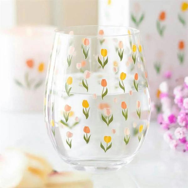Stemless tulip-print glass with tulip flowers in yellow, pink, and green