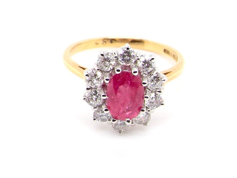 Vintage Tom A fine ruby and diamond cluster ring