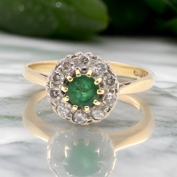 Vintage Tom A vintage Emerald and Diamond cluster ring