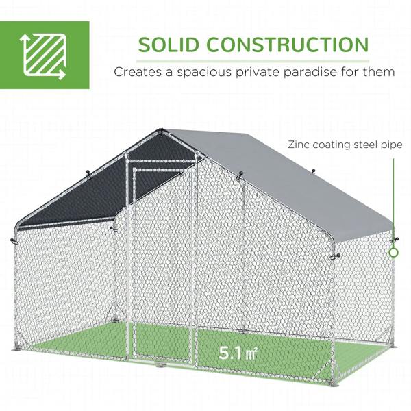 Galvanized wire chicken coop with enclosed run area and dark gray top cover