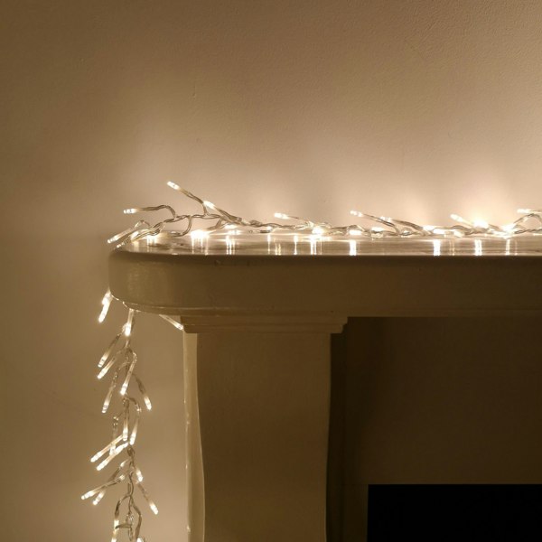 Samuel Alexander 960 LED 12m Premier Cluster Indoor Outdoor Multi Function Mains Operated Christmas Lights with Timer on Clear Cable in Warm White